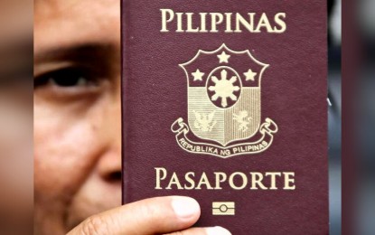 <p>Philippine passport<em> (PNA photo by Joan Bondoc)</em></p>