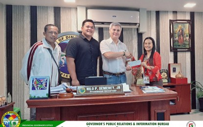 <p><strong>SUPPORT FOR SCHOLARS.</strong> Vice Governor Benglen Ecleo (2nd from right), OIC governor of Dinagat Islands, hands over the PHP5.1 million payment for the tuition fees of 543 scholars of the province to an official of the Don Jose Ecleo Memorial College on Tuesday (June 6, 2023). The payment is intended for the second semester of School Year 2022-2023 covering the months of February to April. <em>(Photo courtesy of Dinagat Islands PIO)</em></p>