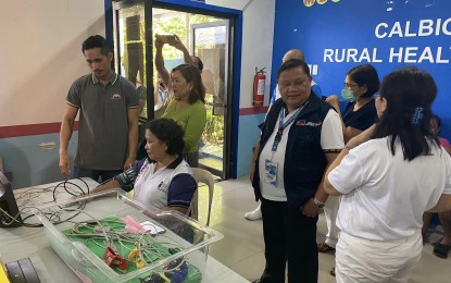<p><strong>TELEMEDICINE.</strong> Officials of the Department of Science and Technology (DOST) led by Regional Director Ernesto Granada (center in blue jacket) visits a rural health unit in Calbiga, Samar in this June 6, 2023 photo. The DOST has already deployed 71 RxBox in Eastern Visayas region, providing telemedicine service access to rural health units. <em>(Photo courtesy of DOST Region 8)</em></p>