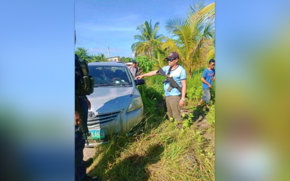 <p><strong>BULLET RIDDLED.</strong> A police officer points to the bullet holes in the windshield of the teacher’s car after the 7 a.m. ambush on Thursday (June 8, 2023) in Datu Anggal Midtimbang town in Maguindanao del Sur. The teacher, identified as Israel Paquital of the Datu Anggal Midtimbang Elementary School, was seriously wounded in the incident.<em> (Photo courtesy of Datu Anggal Midtimbang MPS)</em></p>