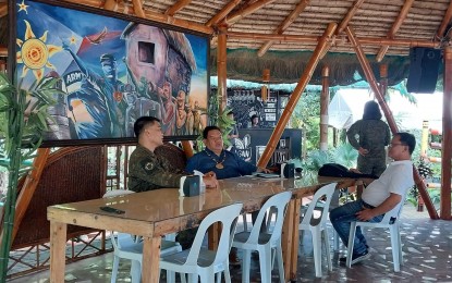 <p><strong>SECURITY COORDINATION.</strong> Lawyer Lionel Marco Castillano (center), Comelec Central Visayas acting regional director, in a meeting with Army Col. Joey Escanillas of the 302nd Infantry Brigade and lawyer Eddie Aba, Negros Oriental provincial election supervisor on Thursday (June 8, 2023). The Comelec regional official visited the province for three days to meet with various sectors prior to the June 27-29 public hearings on the proposed deferment of the barangay and SK elections in Negros Oriental. <em>(Photo courtesy of Comelec)</em></p>