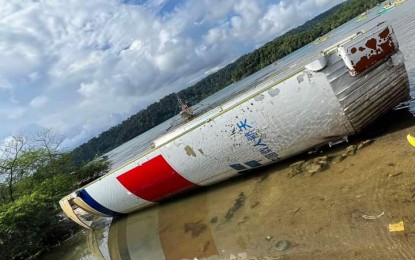 <p><strong>ROCKET DEBRIS.</strong> The rocket debris lies on the shorelines of Morong, Bataan shortly after it was towed out of the sea on June 5, 2023. The Philippine Coast Guard is in possession of the debris for investigation. <em>(Photo courtesy of PCG)</em></p>