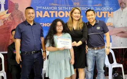 <p><strong>CHESS WUNDERKIND</strong>. The National Master title is conferred on Nika Juris Nicolas (2nd from left) by the National Chess Federation of the Philippines (NCFP) during the awarding ceremony of the National Youth and Schools Chess Championships grand finals in Dapitan City, Zamboanga del Norte on June 9, 2023. Also in photo are (from left) Grandmaster Jayson Gonzales and Nicolas’ parents, NCFP legal counsel Nikki De Vega and Krisanto Karlo Nicolas, also a lawyer. <em>(Contributed photo)</em></p>