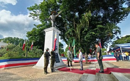 <p><strong>WREATH OFFERING</strong>. Energy Secretary Raphael Perpetuo Lotilla offers flowers before the monument of Ilonggo hero Gen. Martin Delgado during the commemoration of the 125th anniversary of the Independence Day and Nationhood held in the municipality of Sta. Barbara, Iloilo on Monday (June 12, 2023). In his message during the ceremony, Lotilla cited the role of Western Visayas in achieving energy independence. <em>(PNA photo by PGLena)</em></p>