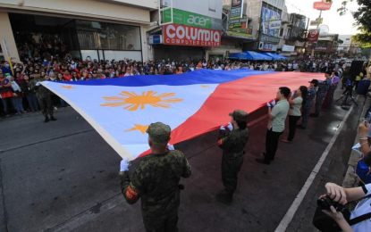 <p><strong>NATION-BUILDING.</strong> A giant Philippine flag is carried by sector representatives in Cagayan de Oro City on Monday (June 12, 2023) during the observation of the 125th Independence Day. Local chief executives in Northern Mindanao lead their respective Independence Day celebrations, highlighting the importance of freedom and democracy in their speeches. <em>(Photo courtesy of Cagayan de Oro CIO)</em></p>