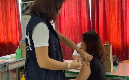 <p><strong>BOOSTED</strong>. Healthcare workers at the Mariano Marcos Memorial Hospital and Medical Center in Batac City, Ilocos Norte get their third booster dose of the coronavirus disease 2019 vaccine, which is a bivalent one from Pfizer, on Tuesday (June 13, 2023). The hospital's medical chief, Dr. Maria Lourdes Otayza, led the ceremonial rollout of the vaccine in Ilocos Norte. <em>(Photo courtesy of MMMH&MC)</em></p>