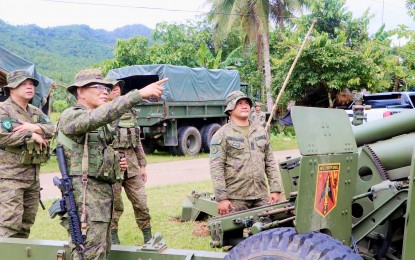 <p><br /><strong>NEW HOME</strong>. Philippine Army's 802nd Infantry Brigade commander Brig. Gen. Noel Vestuir points to a facility during his visit to one of the army camps in Eastern Samar in this undated photo. The Philippine Army’s 802nd IBde has been transferred from Leyte province to Eastern Samar to help suppress the insurgency in Samar Island. <em>(Photo courtesy of Philippine Army)</em></p>