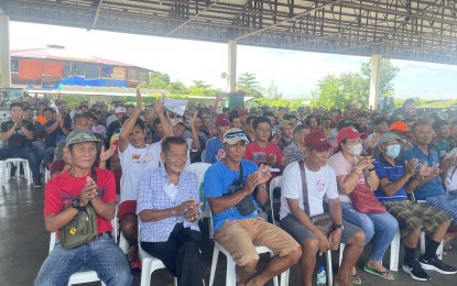 Laoag fishers affected by dredging project get cash aid  