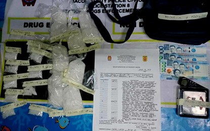 <p><strong>DRUG HAUL</strong>. The 800 grams of shabu worth PHP5.44 million and other evidence seized by police anti-drug agents from suspect Rene Lapera Jr., 26, during a buy-bust in Purok Villa Lourdes, Barangay Pahanocoy, Bacolod City on Sunday (June 18, 2023). Brig. Gen. Sidney Villaflor, director of Police Regional Office-Western Visayas, said it is one of the biggest accomplishments of the Bacolod City Police Office. <em>(Photo courtesy of Bacolod City Police Office)</em></p>