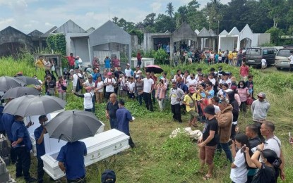 <p><strong>FINAL REST.</strong> The four members of the Fausto family are laid to rest at Barangay Aguisan Public Cemetery in Himamaylan City, Negros Occidental on Sunday (June 18, 2023). Investigations are ongoing on the death of couple Rolly and Emilda Fausto and their two minor sons who were found dead with gunshot wounds at their home in remote Sitio Kangkiling in Barangay Buenavista on June 14. <em>(Photo courtesy of Himamaylan City Social Welfare and Development Office)</em></p>