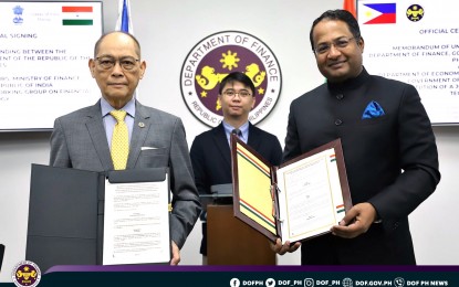 <p><strong>FINTECH AGREEMENT.</strong> Finance Secretary Benjamin Diokno and Ambassador of India to the Philippines Shambhu Santha Kumaran signed an agreement to enhance cooperation financial technology on Monday (June 19, 2023). A joint working group will be formed to facilitate inter-governmental discussions. <em>(Photo from DOF)</em></p>