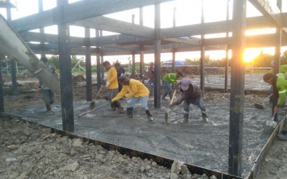 <p><strong>HOUSING PROJECT.</strong> Workers laying the foundation for the initial units of the Yuhum Residences at the Arao relocation site in Barangay Vista Alegre, Bacolod City earlier this month. Being implemented under the Pambansang Pabahay Para sa Pilipino Housing program, at least 400 units are expected to be finished in time for the second State of the Nation Address of President Ferdinand R. Marcos Jr. next month. (<em>Photo courtesy of Albee Benitez Facebook page</em>)</p>