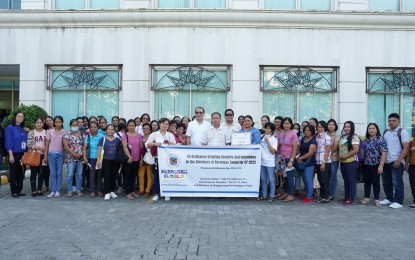 <p><strong>INCENTIVE</strong>. Barangay treasurers from the municipality of Tubungan in Iloilo province receive the cash incentives intended for their village watchmen, during a ceremonial distribution on Monday (June 19, 2023). The provincial government has allocated PHP22 million for the 2022 cash incentive of about 22,000 village watchmen in the province. <em>(Photo courtesy of Balita Halin sa Kapitolyo)</em></p>