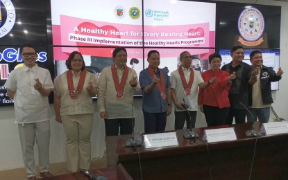 <p><strong>HEALTHY HEARTS</strong>. Department of Health Western Visayas Center for Health Development Director Adriano Suba-an, Iloilo Governor Arthur Defensor Jr., and World Health Organization (WHO) Philippines Country Representative Dr. Rui Paulo de Jesus (3rd to 5th from left) and other health officials make the heart sign in a press conference before the launch of Phase III of the Healthy Hearts Program at the Casa Real in Iloilo City on Wednesday (June 21, 2023). Phase III covers 16 additional municipalities of the province.<em> (PNA photo by PGLena)</em></p>