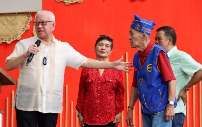 <p><strong>CENTENARIAN HERO</strong>. The provincial government of Batangas honors Fidel Gonzales Macahia, a World War II veteran and a centenarian from the City of Tanauan. Seen with Governor Hermilando Mandanas in this undated photo, he made a daring escape from the Death March during the Japanese invasion. <em>(Photo courtesy of Batangas PIO)</em></p>