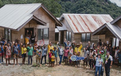 <p><strong>HOME.</strong> Eighty-one housing units are formally handed over to Mamanwa tribe families in Daging Tribal Village, Barangay Urbiztondo, Claver, Surigao del Norte on Wednesday (June 21, 2023). The PHP25 million project was funded by the National Housing Authority and Claver’s local government. <em>(Photo courtesy of Claver LGU)</em></p>