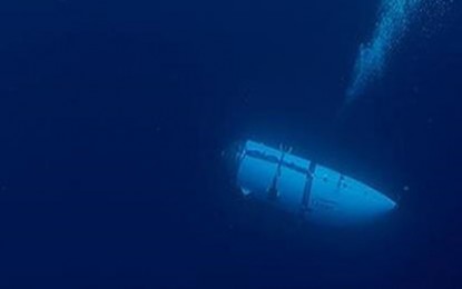 <p><strong>FATAL VOYAGE.</strong> The Titanic submersible that has been missing since Sunday (June 18, 2023) suffered a loss of pressure that imploded the vessel, killing all five passengers aboard, according to the US Coast Guard on Thursday (June 22). A portion of the submersible was discovered roughly 1,600 feet from the bow of Titanic's wreck on the sea floor. <em>(Photo courtesy of Anadolu)</em></p>