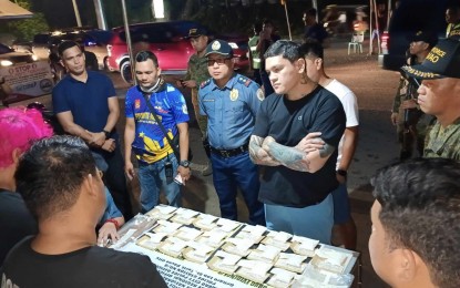 <p><strong>ILLEGAL DRUGS.</strong> Davao City Mayor Sebastian Duterte confronts the two suspects arrested on Sunday (June 25, 2023) for trying to sneak in an estimated 1.1 kilogram of shabu into Davao City from North Cotabato. Task Force Davao identified the suspects as Cresil Jay Lacia, 29, and Antonio Palacios Jr., 30, both from New Corella, Davao del Norte. <em>(Photo courtesy of Toril Police Station)</em></p>