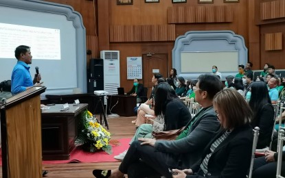 <p><strong>OVERSEAS FILIPINOS.</strong> Manolo Tibe, Overseas Emigrant Services Officer II of the Commission on Filipinos Overseas, briefs officials and employees of Dumaguete City, Negros Oriental on their mandate during a forum at the city hall on Monday (June 26, 2023). Tibe said the country is losing many teachers and professionals to the Exchange Visitor Program of the US government granting temporary employment <em>(PNA photo by Mary Judaline Partlow)</em></p>