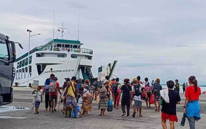 <p><strong>RETURNED</strong>. Seventy-seven Badjaos rescued in Iloilo City and the municipality of Dumangas board a roll-on, roll-off vessel at the Dumangas Port going back to Bacolod City on June 24, 2023. Iloilo City Mayor Jerry P. Treñas said on Monday (June 26) the local government will not allow Badjaos to stay in the city because they have no jobs. <em>(PNA photo courtesy of Jerry P. Treñas FB page) </em></p>