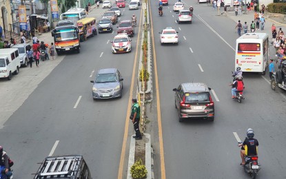 <p>One of the main thoroughfares in Cagayan de Oro City. <em>(PNA file photo by Nef Luczon)</em></p>