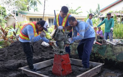 <p><strong>WATER SUPPLY</strong>. An undated photo shows Ako Bicol Party-list workers installing a Level 1 water supply system at San Andres Elementary School, being used as an evacuation center in Sto. Domingo, Albay. Similar facilities will be installed in Guinobatan, Camalig, and Daraga towns where several families are currently housed in evacuation centers amid the unrest of Mt. Mayon. <em>(Photo courtesy of AKB)</em></p>