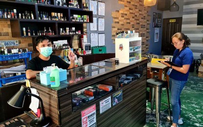 <p><strong>TIGHTENED MONITORING.</strong> Personnel from the Department of Trade and Industry in Agusan del Norte (DTI-ADN) conducts monitoring of a vape shop in Butuan City on Monday (June 26, 2023) for compliance with the provisions of Republic Act Nos. 11900, 11346, and 11467. DTI-ADN says 11 vape shops in the cities of Butuan and Cabadbaran in Agusan del Norte are compliant with the provisions of relevant laws. <em>(Photo courtesy of DTI-ADN)</em></p>