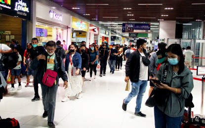 <p><strong>PASSENGER INFLUX.</strong> Commuters make their way to the boarding areas of the Paranaque Integrated Terminal Exchange on June 26, 2023. The Department of Transportation (DOTr), its attached agencies, and other government offices on Friday (Oct. 27, 2023) activated Oplan Biyaheng Ayos 2023 that will place all transportation hubs on heightened alert to ensure the safety, security, and convenience of both passengers and motorists during the election and Undas. <em>(PNA photo by Jess M. Escaros Jr.)</em></p>
