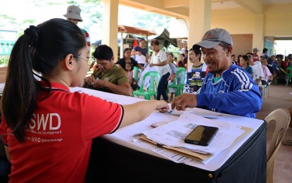 <p><strong>CASH FOR WORK.</strong> At least 593 beneficiaries of the Department of Social Welfare and Development’s Risk Resiliency Program–Cash for Work in Barangays San Vicente and San Mariano in Loreto, Agusan del Sur, received their payments on Wednesday (June 28, 2023) following a 10-day work. The agency released over PHP2 million in total payment to the recipients. <em>(Photo courtesy of DSWD-13)</em></p>