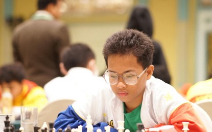 <p><strong>CHESS WIZARD.</strong> Zamboangueño chess wizard John Cyrus Borce focuses on his moves as he competes in the chess championships in Thailand from June 17 to 27, 2023. Borce, 14, won two silver medals in the team competition of Under 18 Open-Standard and Rapid Events and a bronze medal in the Blitz event.<em> (Photo courtesy of Zamboanga City Sports Division Office)</em></p>