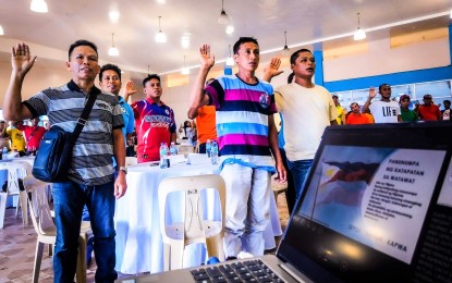 <p><strong>FIGHTING INSURGENCY.</strong> Village officials in Northern Samar expressing their support to the National Action Plan on Preventing and Countering Violent Extremism in this June 20, 2023 photo. The Department of the Interior and Local Government (DILG) has rolled out the plan in three Samar provinces. <em>(Photo courtesy of DILG)</em></p>