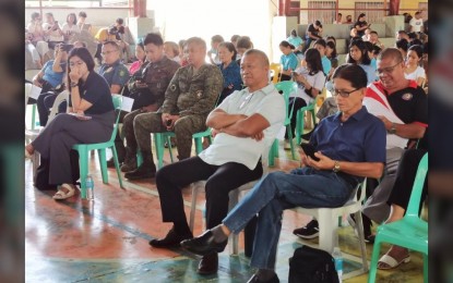 <p>PUBLIC HEARING. Mayor Galicano Truita (center in white polo shirt) and Vice Mayor Rodrigo Alanano (front in blue shirt) of Dauin, Negros Oriental attend the third leg of the public hearing on the proposed deferment of the Barangay and Sangguniang Kabataan elections in the province, at the town's gymnasium on Thursday (June 28, 2023). The Comelec thanked the stakeholders for the peaceful and successful staging of the public hearings. <em>(PNA photo by Judy Flores Partlow)</em></p>