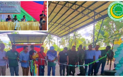 <p><strong>ACTIVITY CENTER.</strong> Bangsamoro Autonomous Region in Muslim Mindanao (BARMM) Interior Minister Naguib Sinarimbo (center black shirt) assists in the ribbon-cutting ceremony of the PHP5-million activity center in Barangay Buricain, Pigcawayan, North Cotabato, Thursday (June 29, 2023). Sinarimbo (inset) noted in his speech that the village is one of the 63 villages in North Cotabato that now forms part of the BARMM’s Special Geographic Area.<em> (Photo courtesy of MILG-BARMM)</em></p>