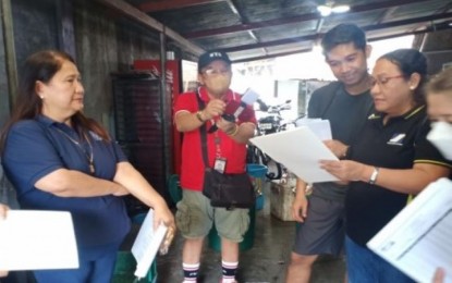 <p><strong>CAMPAIGN</strong>. Social Security System Visayas West 1 Division vice president Lilani Benedian (left) with legal officer Maria Conchita Antipatia (2nd from right) and Victorias Branch head Brenda Cruz (right) during a recent Run After Contribution Evaders (RACE) campaign in Victorias City, Negros Occidental. In the province alone, the SSS aims to collect PHP18.2 million worth of past-due contributions from 52 delinquent employers following a series of RACE operations in June. <em>(Photo courtesy of SSS Bacolod Branch)</em></p>