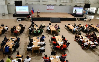 <p><strong>CONVERGENCE</strong>. Emergency responders from across Negros Oriental attend the opening salvo of the National Disaster Resilience Month celebration on Monday (July 4, 2023) at the convention center in Dumaguete City. Governor Manuel Sagarbarria (on stage) reassures local government units of resource augmentation for disaster response and mitigation. <em>(Photo from the provincial government of Negros Oriental's Facebook page)</em></p>