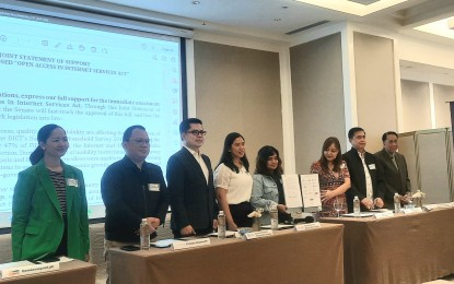 <p><strong>OPEN ACCESS</strong>. Several groups from the private sector issue a joint statement urging the Congress to immediately pass the Open Access in Internet Services Act on July 5, 2023 at Discovery Primea, Makati City. They also wish that President Ferdinand R. Marcos Jr. to certify the bill as urgent. <em>(PNA photo by Kris M. Crismundo)</em></p>