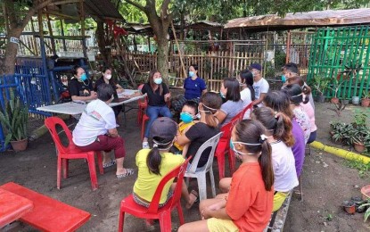 <p><strong>DISEASE PREVENTION</strong>. Personnel of the City Health Office (CHO) hold a dialogue on disease prevention, including dengue, in this undated photo. The CHO calls on barangays and households to do regular cleanups to rid their surroundings of mosquito-breeding sites. <em>(Photo courtesy of Iloilo City Health Office FB page)</em></p>