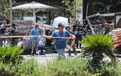 <p><strong>CAR RAMMING.</strong> Authorities cordon off the site of the incident in a commercial area of northern Tel Aviv on Tuesday (July 4, 2023). Seven people were injured in the car ramming and stabbing incident. <em>(Photo by Yossi Zeliger/TPS)</em></p>