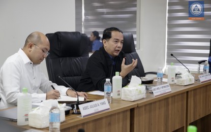 <p><strong>POST-DISASTER PLANNING.</strong> Office of Civil Defense administrator Undersecretary Ariel Nepomuceno (in black) speaks during the meeting of the National Task Force on the Oil Spill Management, held in Camp Aguinaldo, Quezon City on Tuesday (July 4, 2023). The OCD said a total of PHP867.2 million worth of assistance have been provided to the affected communities and that the task force is preparing the post-disaster needs assessment to plan the programs, projects, and activities for rehabilitation and recovery of the affected areas. <em>(Photo courtesy of OCD)</em></p>
