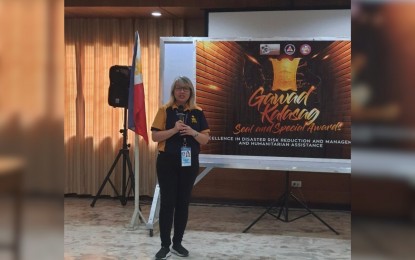 <p><strong>GAWAD KALASAG</strong>. Shelby A. Ruiz, officer-in-charge of the Office of Civil Defense 3 and chairperson of the Regional Disaster Risk Reduction and Management Council (RDRRMC-3) delivers her message during the announcement of the top winners in this year's Gawad Kalasag (GK) seal and special awards in Central Luzon on Tuesday (July 4, 2023) in the City of San Fernando in Pampanga. The regional winners will automatically be nominated for the National Gawad Kalasag awards. <em>(Photo courtesy of OCD Central Luzon)</em></p>