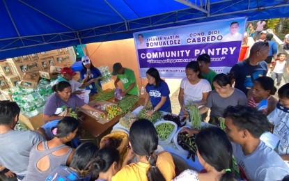 <p><strong>VEGETABLES FOR FREE</strong>. Evacuees sheltered in Guinobatan town get fresh vegetables from the harvested farm products of women planters in the third district of Albay through a community pantry organized by the office of Rep. Fernando Cabredo in this undated photo. The National Nutrition Council in Bicol on Thursday (July 6, 2023) urged the local government units in Albay province to provide fresh produce for the evacuees. (<em>Photo courtesy of Rep. Cabredo's office</em>)</p>
<p> </p>
<p> </p>