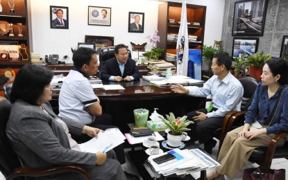 <p>LOAN AGREEMENT. Public Works Secretary Manuel Bonoan (center) meets with representatives of the Asian Development Bank (ADB) and other stakeholders to discuss crucial preparations for the loan agreement for the Bataan-Cavite Interlink Bridge project, during the two-week discussion from June 16 to July 5, 2023. The DPWH said it seeks to secure a loan approval by November. <em>(Photo courtesy of DPWH) </em></p>