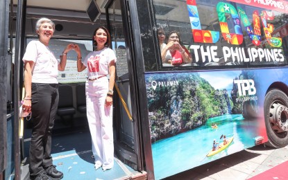 <p><strong>HOHO</strong> <strong>BUS</strong> <strong>TOUR</strong>. Tourism Secretary Christina Frasco (right) and Manila Mayor Honey Lacuna lead the launch of the Department of Tourism's Hop-On, Hop-Off (HOHO) bus tours at the Kartilya ng Katipunan in Manila on Thursday (July 6, 2023). The new circuit is the second of its kind after the pilot of HOHO Makati Financial Hub tours on May 28. (<em>PNA</em> <em>photo</em> <em>by</em> <em>Yancy</em> <em>Lim</em>)</p>