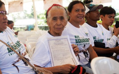 <p><strong>CONDONED LOANS.</strong> At least 10,945 agrarian reform beneficiaries (ARBs) in Caraga Region will directly benefit from the passage of the New Agrarian Emancipation Bill or Republic Act 11953, signed by President Ferdinand Marcos Jr. on Friday (July 7, 2023) in Malacañang. Photo shows several of the ARBs in Caraga during the distribution of the 4,505 hectares of lands conducted by the regional office of the Department of Agrarian Reform in Prosperidad, Agusan del Sur, also on Friday. <em>(Photo courtesy of DAR-13)</em></p>