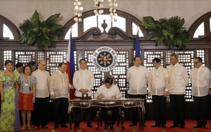 <p>ENACTED INTO LAW. President Ferdinand R. Marcos Jr. signed into law Republic Act 11953 or the New Agrarian Emancipation Act on July 7, 2023.  The measure was one of the president's promises mentioned in his 2022 State of the Nation Address (SONA). <em> (PNA file photo)</em></p>