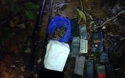 <p><strong>ARMS CACHE SEIZED</strong>. A joint police and Army troops recover weapons, communications equipment and subversive documents from a hideout of the dismantled New People’s Army Northern Negros Front in the hinterlands of Calatrava, Negros Occidental on Saturday. “We will carry on in stepping up our military and non-military operations to recuperate more loose firearms and defuse the remnants of the communist-terrorist group in Negros Island,” Maj. Gen. Marion Sison, commander of 3rd Infantry Division, said in a statement on Monday (July 10, 2023). <em>(Photo courtesy of 79th Infantry Battalion, Philippine Army)</em></p>