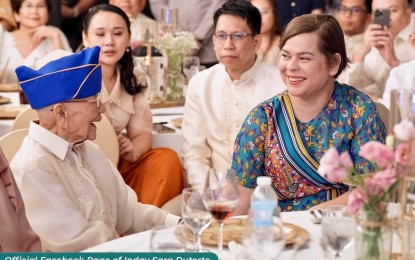 <p><strong>CENTENARIAN.</strong> Vice President Sara Z. Duterte (right) shares a light moment with 100-year-old Teofilo Gamutan, Davao City’s oldest war veteran, during his birthday celebration on Monday (July 10, 2023). Gamutan, fondly called Lolo Filo, is also the oldest of the four remaining war veterans in Davao City. <em>(Photo from Inday Sara Duterte FB Page)</em></p>