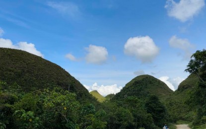 <p>TOURISM POTENTIAL. The "chocolate hills" version of Negros Oriental, found in Hinakpan, Guihulngan City, is a potential tourist destination. The Negros Oriental Provincial Tourism Board is embarking on a program that will identify and develop new potential tourist destinations and products in the first district of the province. <em>(PNA file photo by Judy Flores Partlow)</em></p>