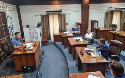 <p><strong>MILESTONE AWARD</strong>. Laoag City Councilor Handy Lao (left) holds a brainstorming meeting prior to the passage of measure granting annual cash incentives to senior citizens in the city aged 101 and above Tuesday (July 11, 2023). This is apart from the one-time grant of PHP100,000 under the Centenarian Act of 2016. <em>(Contributed photo)</em></p>