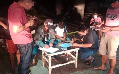 <p><strong>BUSTED.</strong> Authorities arrest a high-value target from Tarlac in a buy-bust operation on Wednesday (July 12, 2023) at Lingayen town, Pangasinan. The operation resulted in the confiscation of PHP2 million of shabu from the suspect. (<em>Photo courtesy of Pangasinan Police Provincial Office</em>)</p>